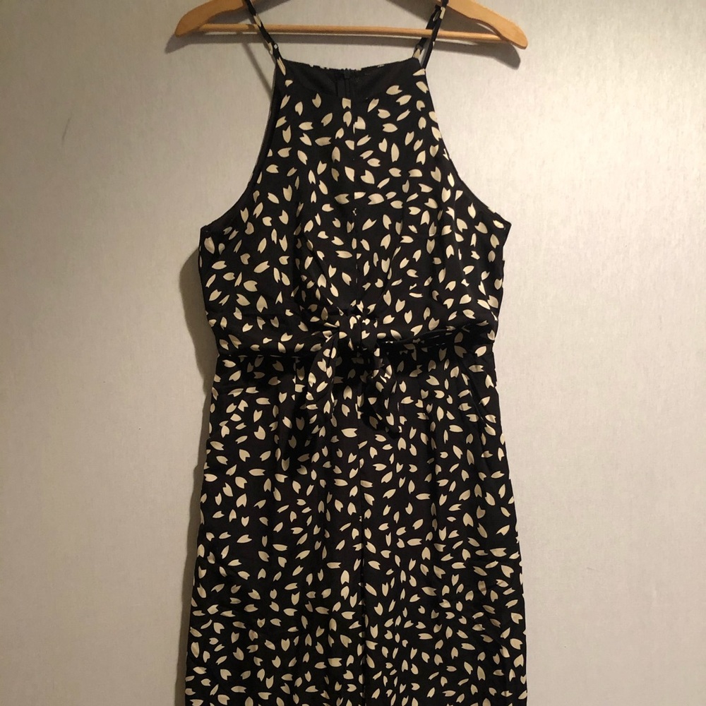 Black and white jumpsuit, patterned with tie front